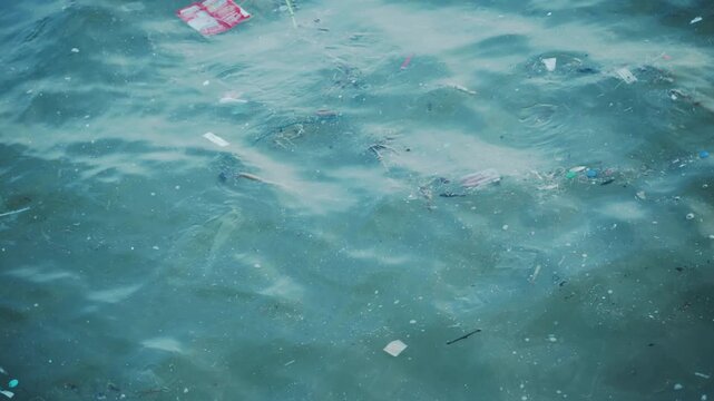 Plastic waste and household garbage floating on the sea surface, ocean pollution concept.,The world's most polluted beach, Plastic marine debris.