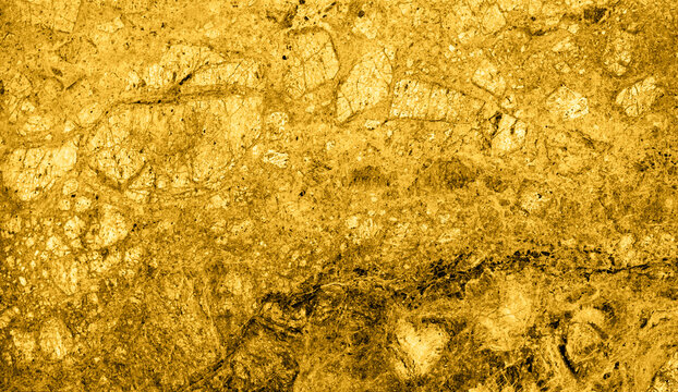 Texture of gold marble slab macro