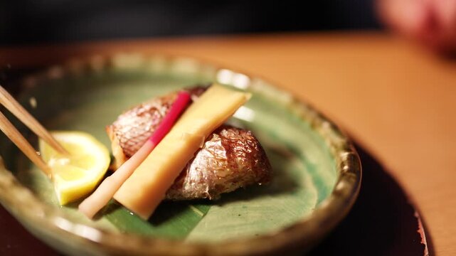 Grilled Japanese Sea Bream Served with Lemon and Ginger Shoots
