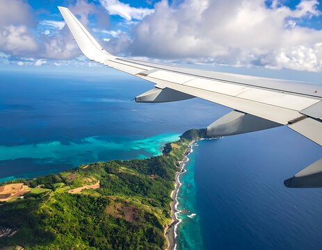 Aerial view of a coastline with airplane wing