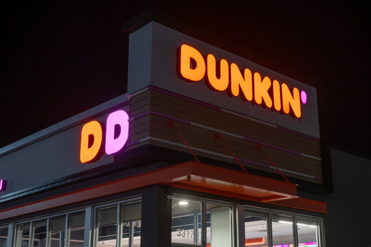 Dunkin&rsquo; Illuminated Sign at Night in St. Cloud, Minnesota.