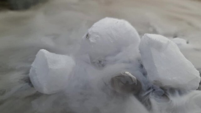 Cryogenic Technology Solid Carbon Dioxide Sublimating in Dark Water