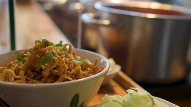 Traditional Northern Thai Khao Soi Curry Noodles in a Ceramic Bowl