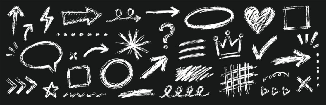 Set of hand drawn chalk elements, arrows, shapes, symbols and doodles on a black background