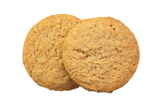 Two cookies are stacked on top of each other on a white background.