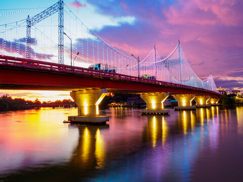 Bridge across the Tapi River in the evening twilight.