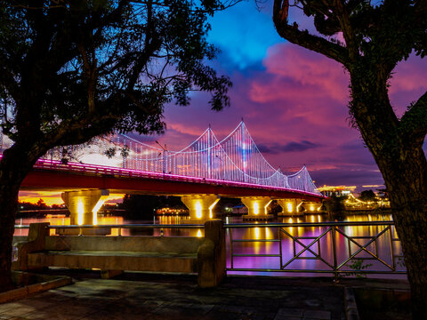 Bridge across the Tapi River in the evening twilight.
