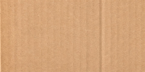Fototapeta premium Corrugated cardboard texture, a raw, natural material ideal for packaging and crafting.