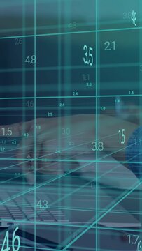 Vertical video: Woman typing on laptop and tapping phone, causing teal grid to show analytics