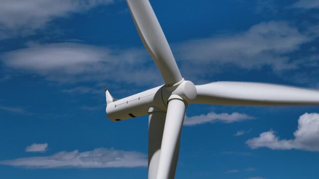 Locked Off Camera Wind Turbines in Oper Desert Drone Aerial View