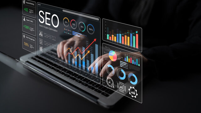 Modern Digital Workspace with Hands Typing on Laptop Surrounded by Interactive Charts and Graphs for Search Engine Optimization Analysis. Bitwise.