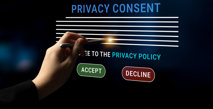 Hand Signing Privacy Consent Agreement on Digital Tablet with Acceptance and Decline Options Visible in Modern User Interface Design Haptic.