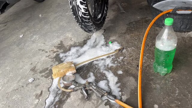Checking Tubeless Tire Leak with Soap Water After Repair