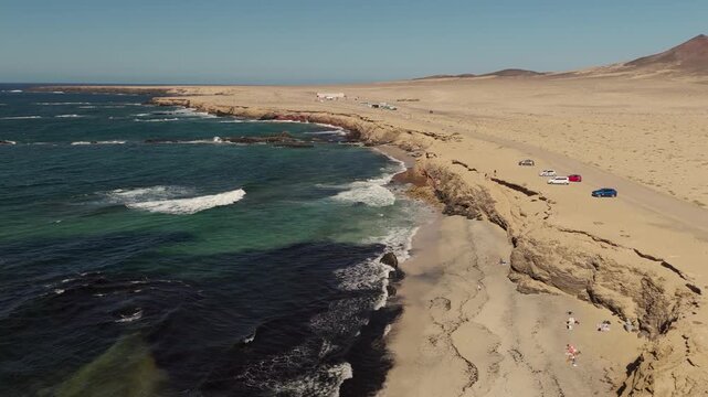 Aerial View of Playa de los Ojos Beach and Volcanic Cliffs in Jandia Fuerteventura Spain