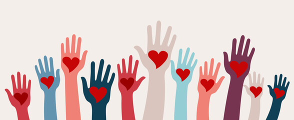 Fototapeta premium Diverse raised hands with red hearts, conceptual unity and support