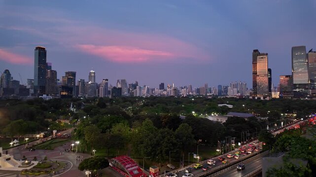 Bangkok, Thailand: Panoramic footage of the sunset over Lumphini park in downtown Bangkok by Silom, the busy street in the heart of Thailand capital city