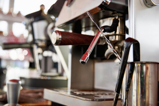 Italian semi-automatic coffee machine equipment at the coffee shop bar