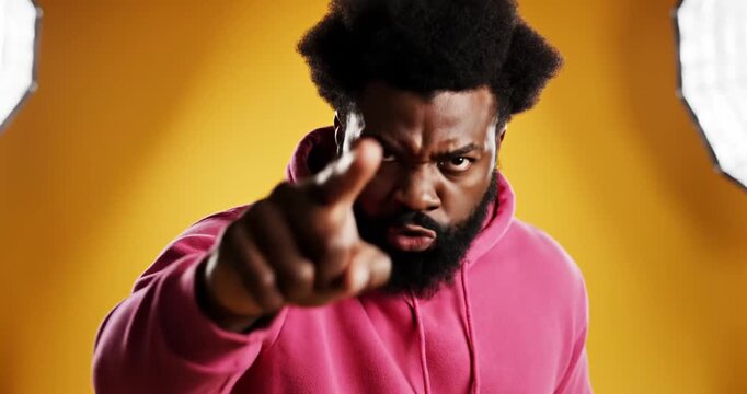 Man Pointing at Camera with Anger.
