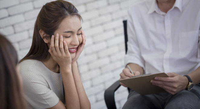 Woman smile counseling therapy clipboard conversation happiness support mental health woman smile counseling therapy session with clipboard