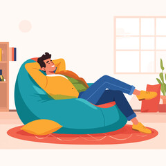 Obraz premium Man relaxing on a bean bag chair in a cozy living room