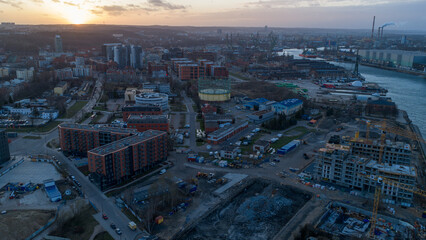 Fototapeta premium Gdansk Waterfront Aerial View at Sunset - Industrial Port City Landscape