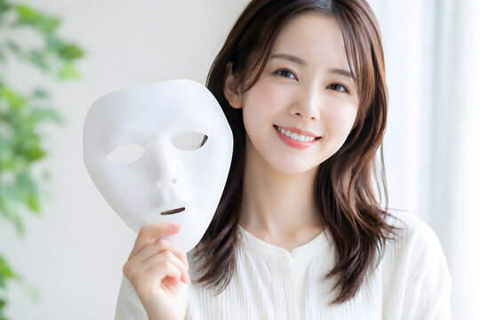 Young woman holding white facial mask, natural beauty skincare concept. Cosmetic facial treatment, healthy glowing skin, dermatology wellness, aesthetic skincare routine, spa therapy, beauty salon, se