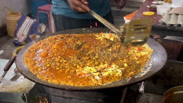 Famous Indian Dish Making of Egg Chana Dal Tadka, Food of eastern Uttar Pradesh in the northern part of the Indian subcontinent, Street Food of India
