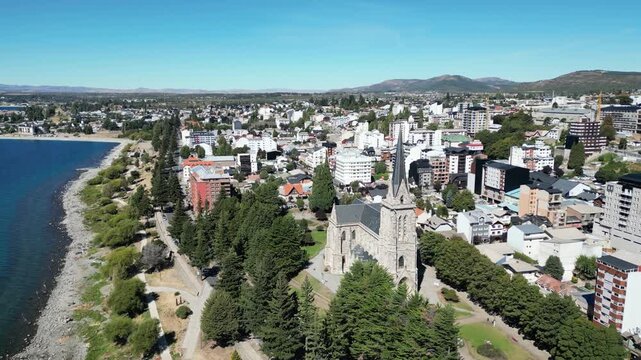 Aerial view of Bariloche city center and cathedral beside Nahuel Huapi Lake in Patagonia Argentina