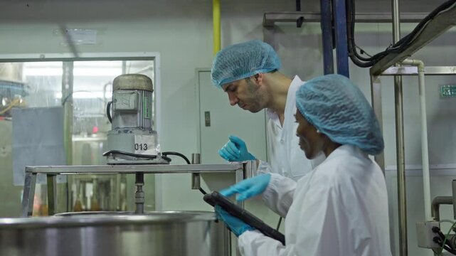 Laboratory team collaborating on food science research industrial kitchen image series clean environment overhead view innovation