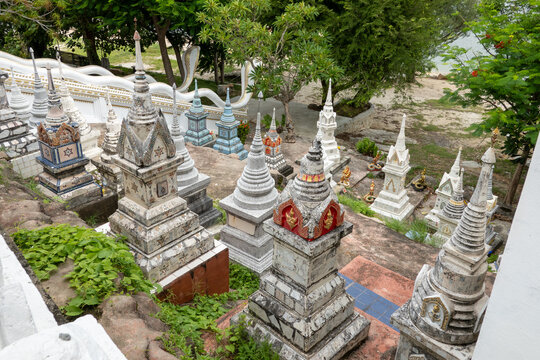 Traditional colorful Thai Buddhist graves and stupas at a temple