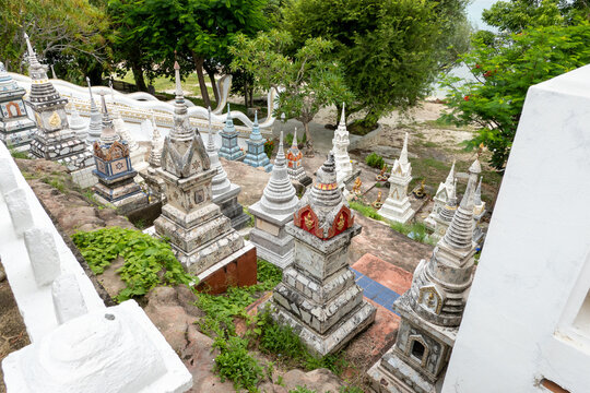 Traditional colorful Thai Buddhist graves and stupas at a temple