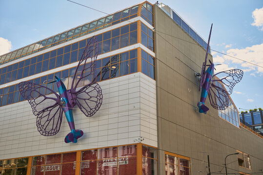Spitfire aeroplanes with butterfly wings created by artist David Cerny on the Maj store in Prague, Czech Republic