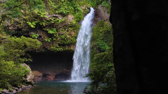 Scenic glimpse of Tavoro Waterfall within Bouma National Heritage Park on tropical island of Taveuni, Fiji, South Pacific