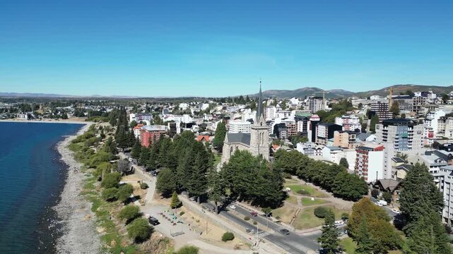 Aerial view of Bariloche cathedral and Nahuel Huapi Lake waterfront in Patagonia Argentina