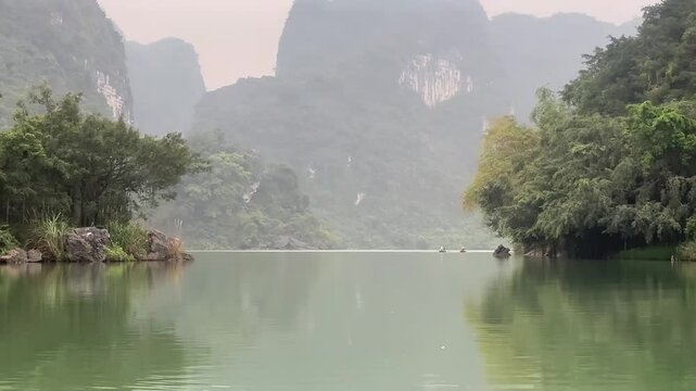 Trang An River Landscape and Limestone Mountains in Vietnam