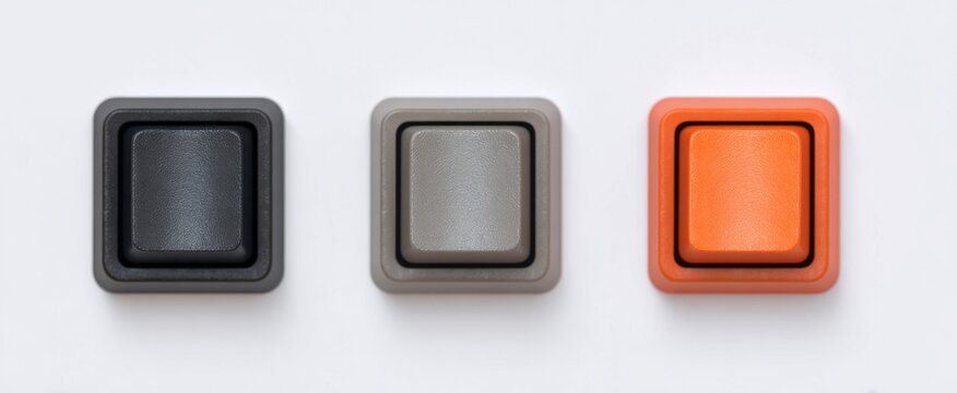 three blank keycaps like canvas awaiting your creative touch for keyboard customization projects