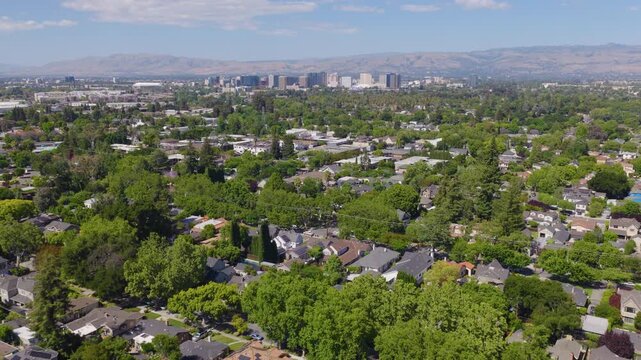 San Jose California Aerial Pullback View of Suburban Homes and Skyline 02