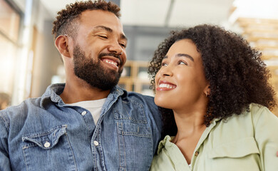 Fototapeta premium Smile, couple and relax with love at house for admiration, partner support and stress relief. Happy, African people and embrace for affection, calm morning and bonding together for weekend break