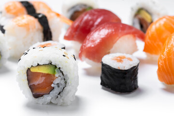 Assorted Sushi Selection isolated on white background © chandlervid85