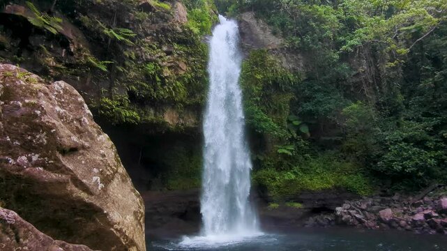 Scenic view Tavoro Waterfall and rugged landscape at Bouma National Heritage Park on Taveuni Island, Fiji in South Pacific