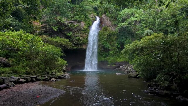 Scenic pan of Tavoro Waterfall located within Bouma National Heritage Park on the tropical island Taveuni in Fiji