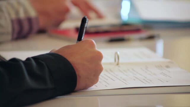 Close-Up of Handwriting on Paper During School Lesson