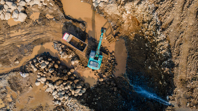 Mining Work in Rock and Sand Quarry, Excavator and Truck in Mining Site from Above