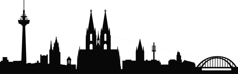 Obraz premium Black silhouette of a city skyline featuring a tall tower twin spires and an arched bridge black and white