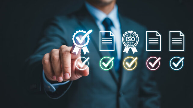 Corporate professional selecting quality management and iso compliance certification icons on digital interface.