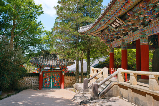 Traditional wooden gate and pavilions of ancient Bulguksa Buddhist Temple, historic cultural landmark in Gyeongju, South Korea.