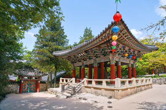 Traditional wooden gate and pavilions of ancient Bulguksa Buddhist Temple, historic cultural landmark in Gyeongju, South Korea