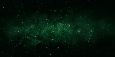 An abstract cosmic background of glowing particles and bright stars dancing across a bright green nebula in the dark outer space universe © RD Visuals
