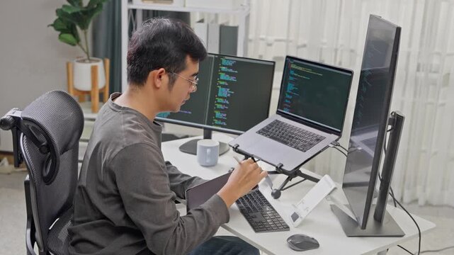 Productive coding session home office digital workspace contemporary environment side view tech engagement