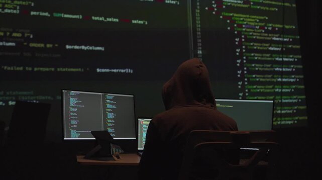 Coding session in dark room office environment digital art programmer's perspective focused on technology and creativity